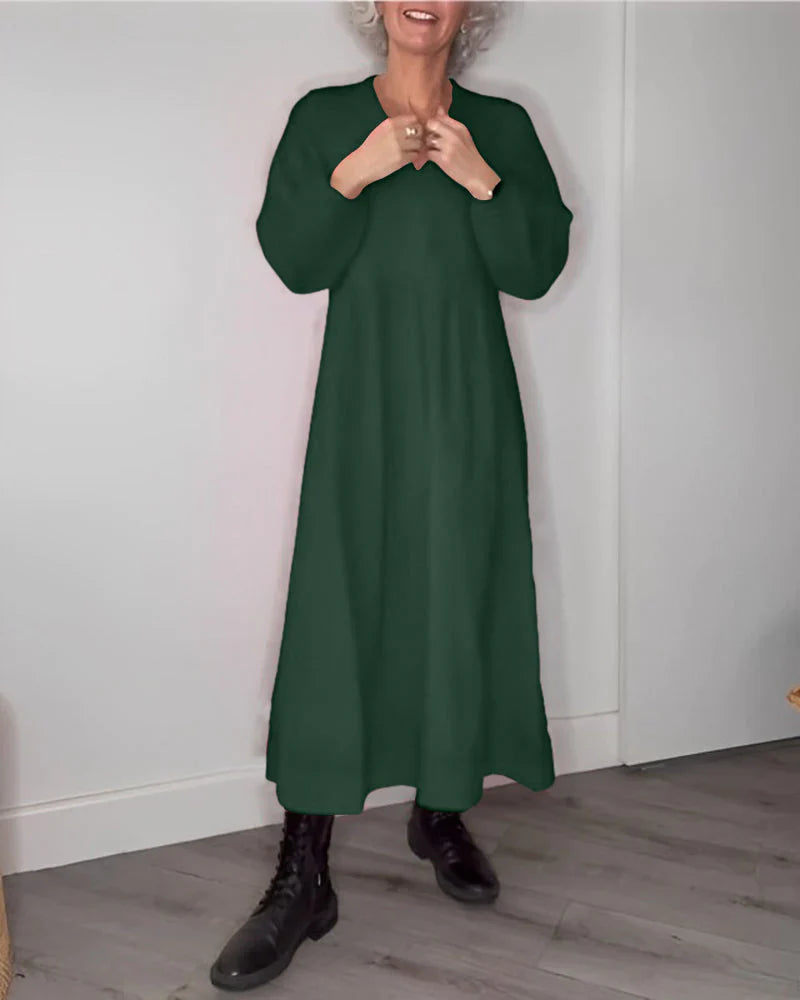 Elegante Jurk met V-ringen en Lange Mouwen