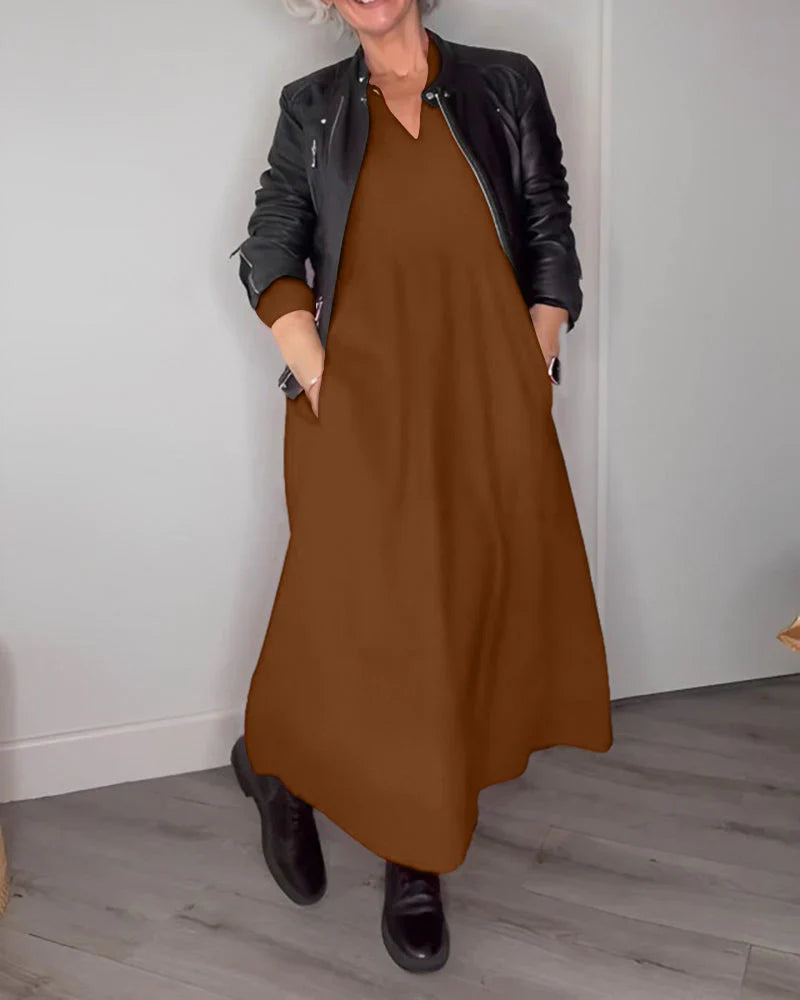 Elegante Jurk met V-ringen en Lange Mouwen