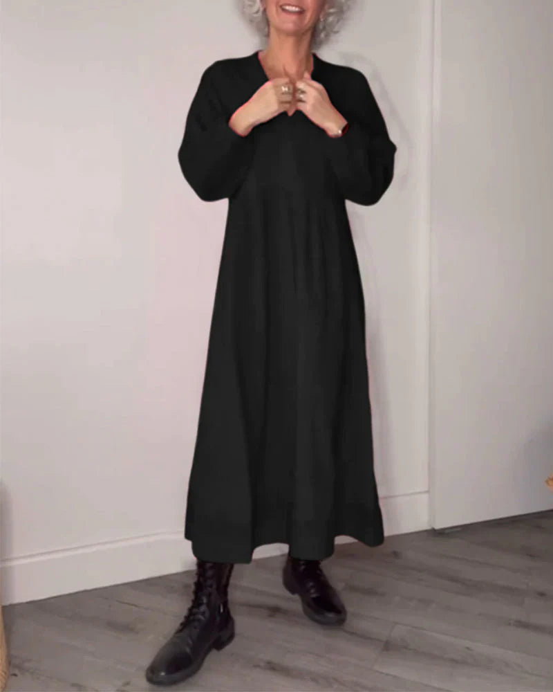 Elegante Jurk met V-ringen en Lange Mouwen