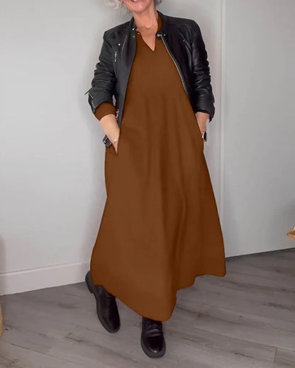 Elegante Jurk met V-ringen en Lange Mouwen